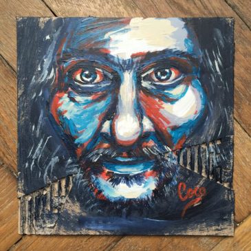 portrait d'un homme barbu dans les tons bleu et rouge